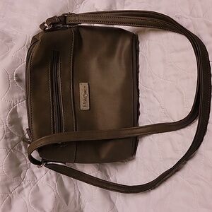 Multi Sac ladies purse , compact but lots of storage and simple eloquence.